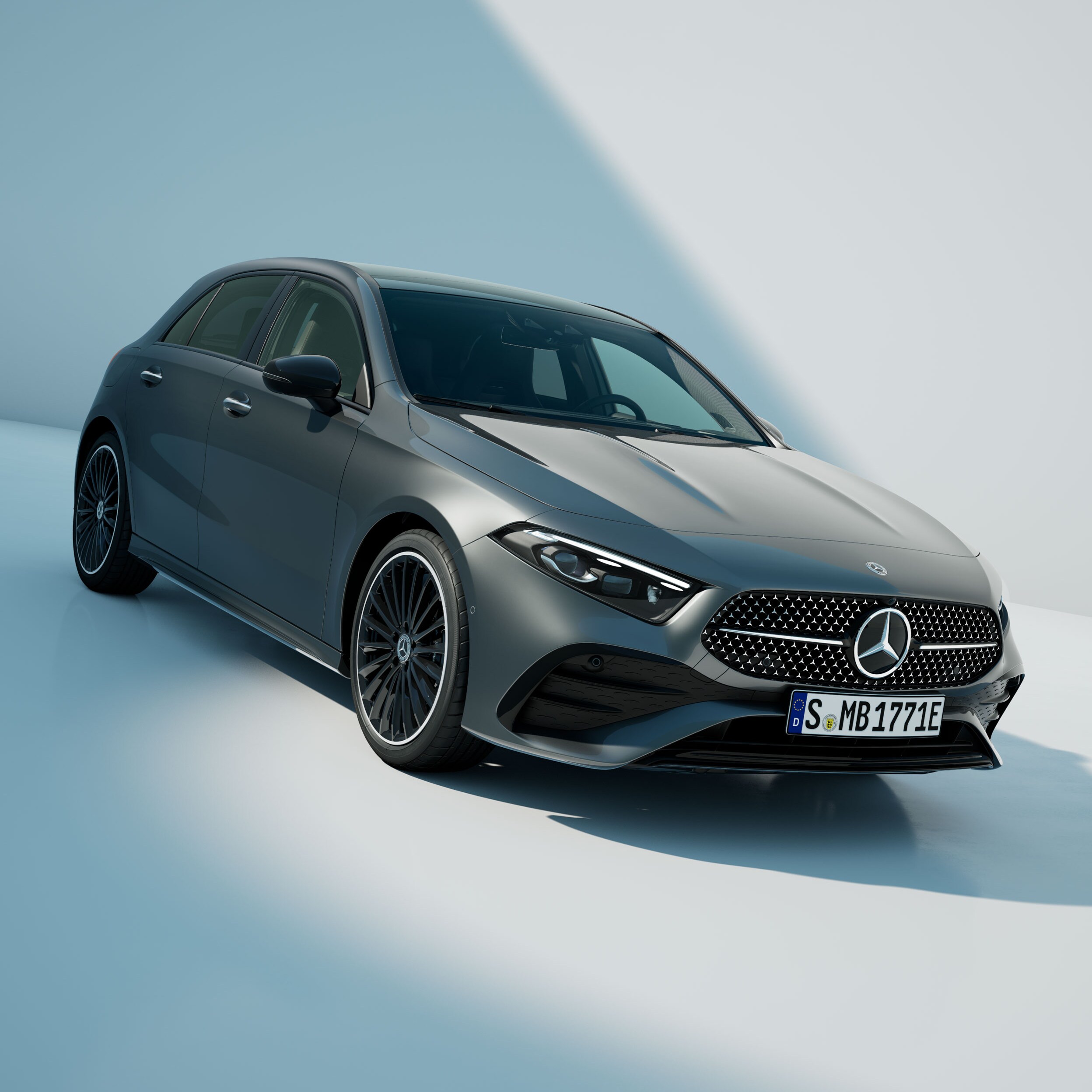 Szara Klasa A Mercedes-Benz na abstrakcyjnym tle.