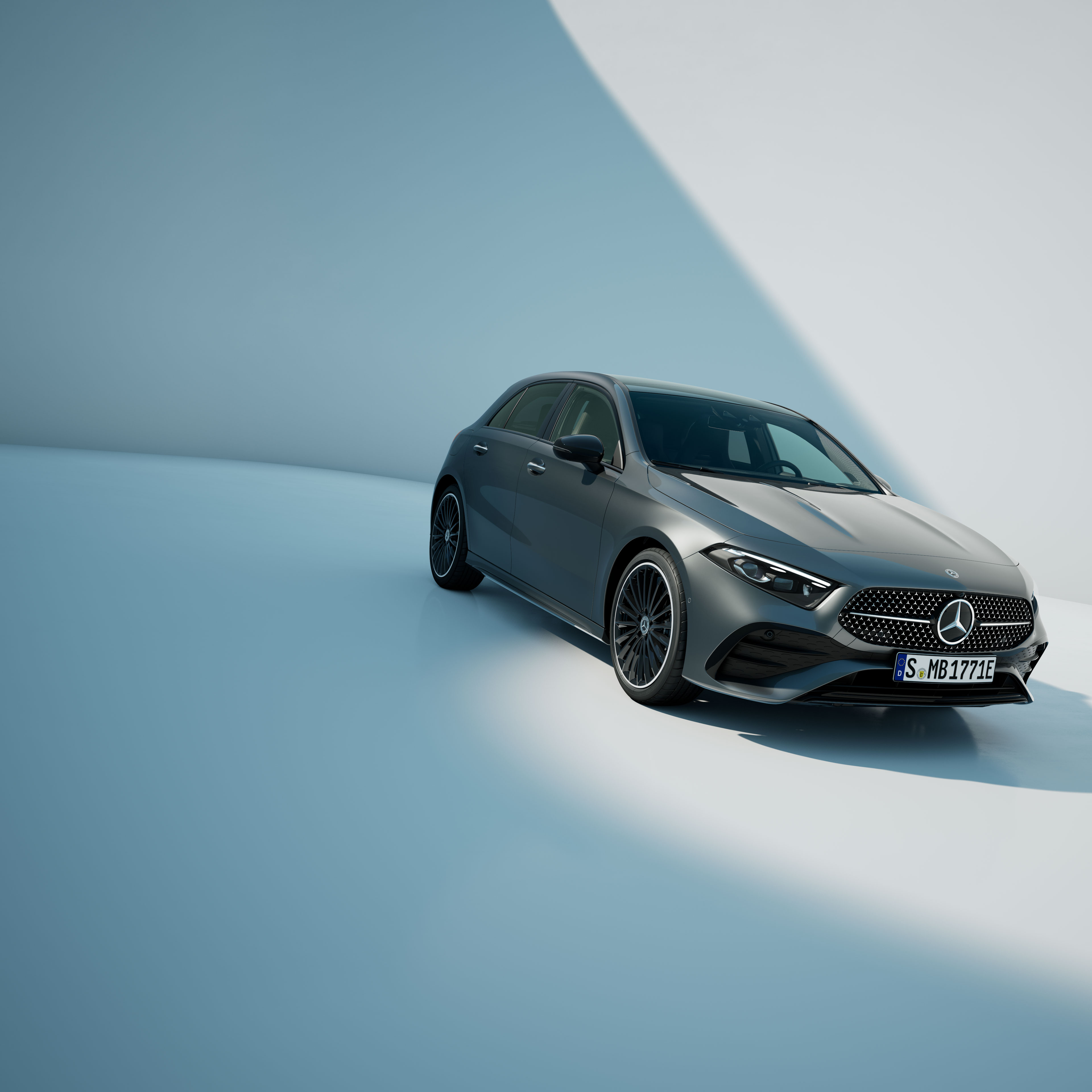 Klasa A | Samochody kompaktowe | Mercedes-Benz Szara Klasa A Mercedes-Benz na abstrakcyjnym tle.