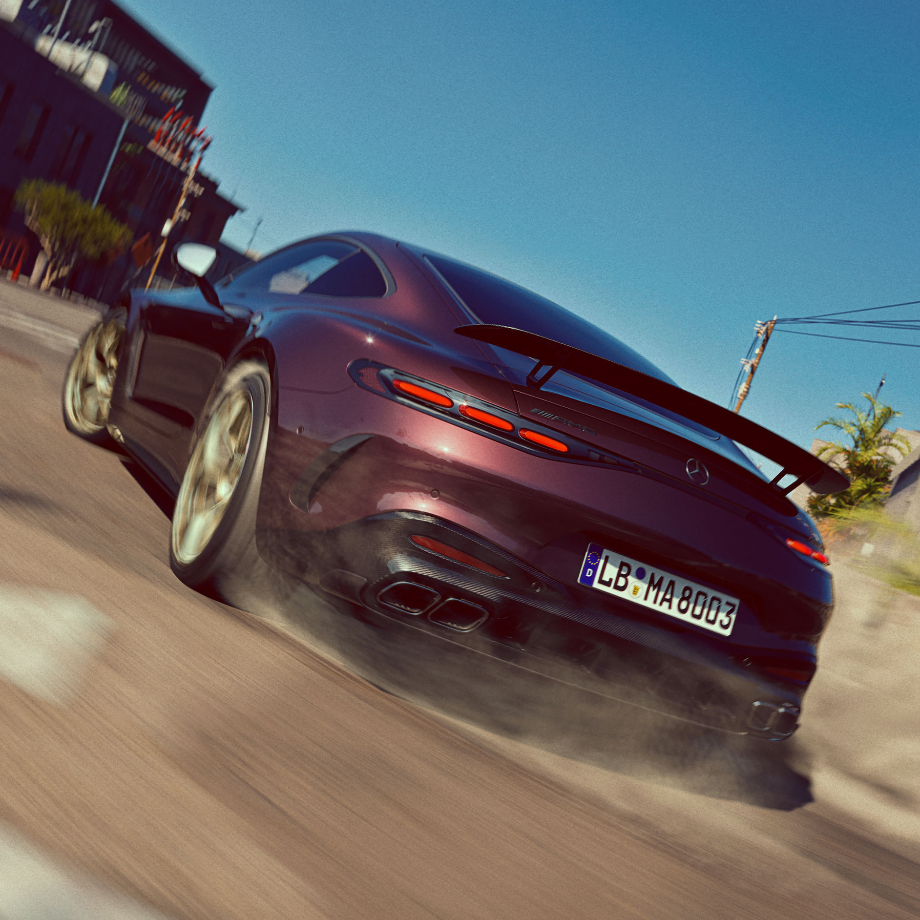 Duch sportu | GT Coupé | Mercedes-AMG Tył modelu Mercedes-AMG GT Coupé jadącego szybko ulicą.