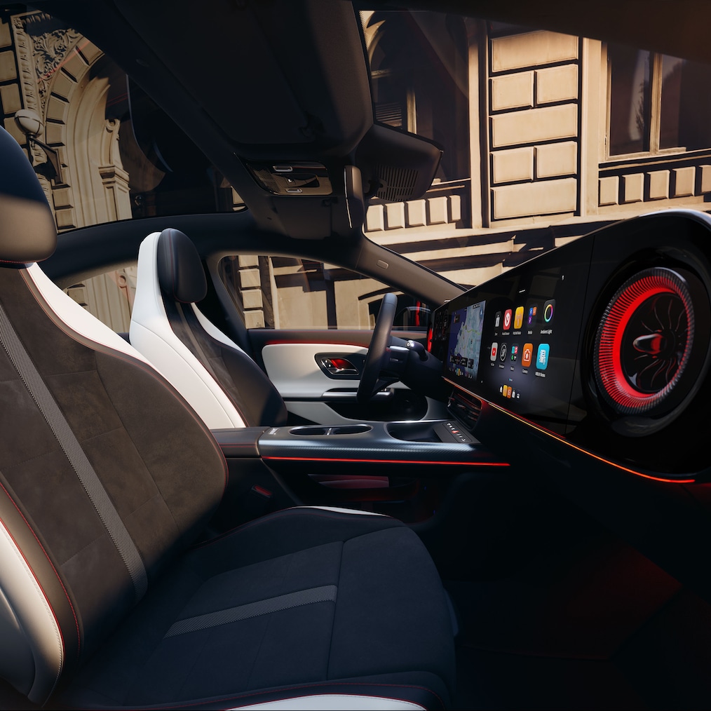 Wnętrze z ekranem MBUX Superscreen i sportowymi fotelami w modelu Mercedes-Benz CLA C174.