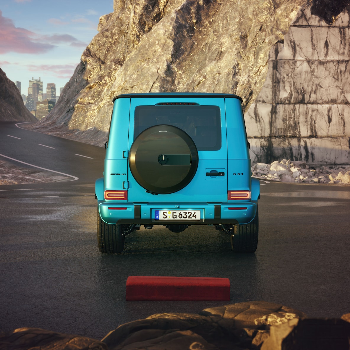 Widok boczny na przód Mercedes-AMG G 63 z pakietem stylizacji nadwozia AMG o wyglądzie włókna węglowego.
