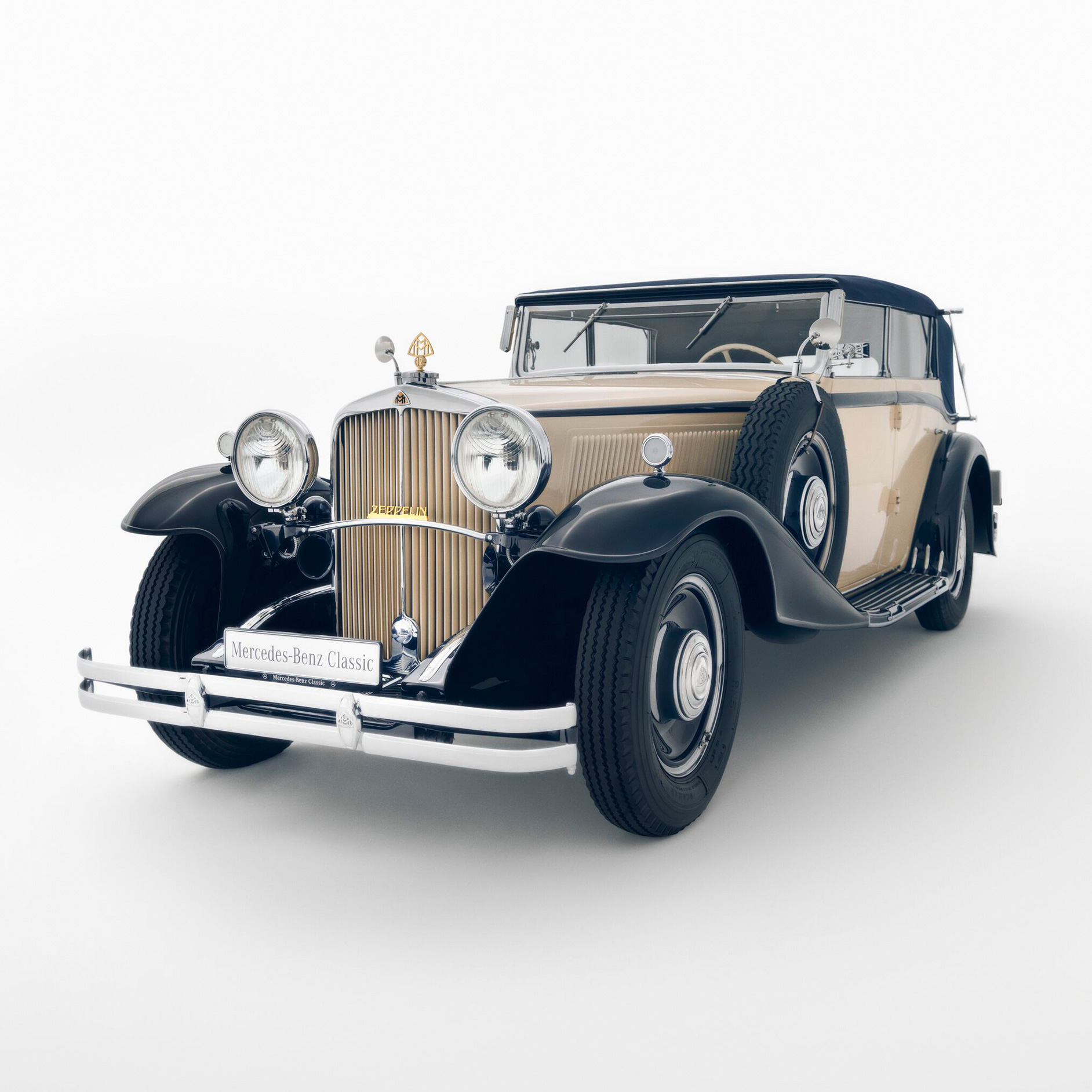 Historia | Marka | Mercedes-Maybach Historyczny samochód Maybach na jasnym tle.