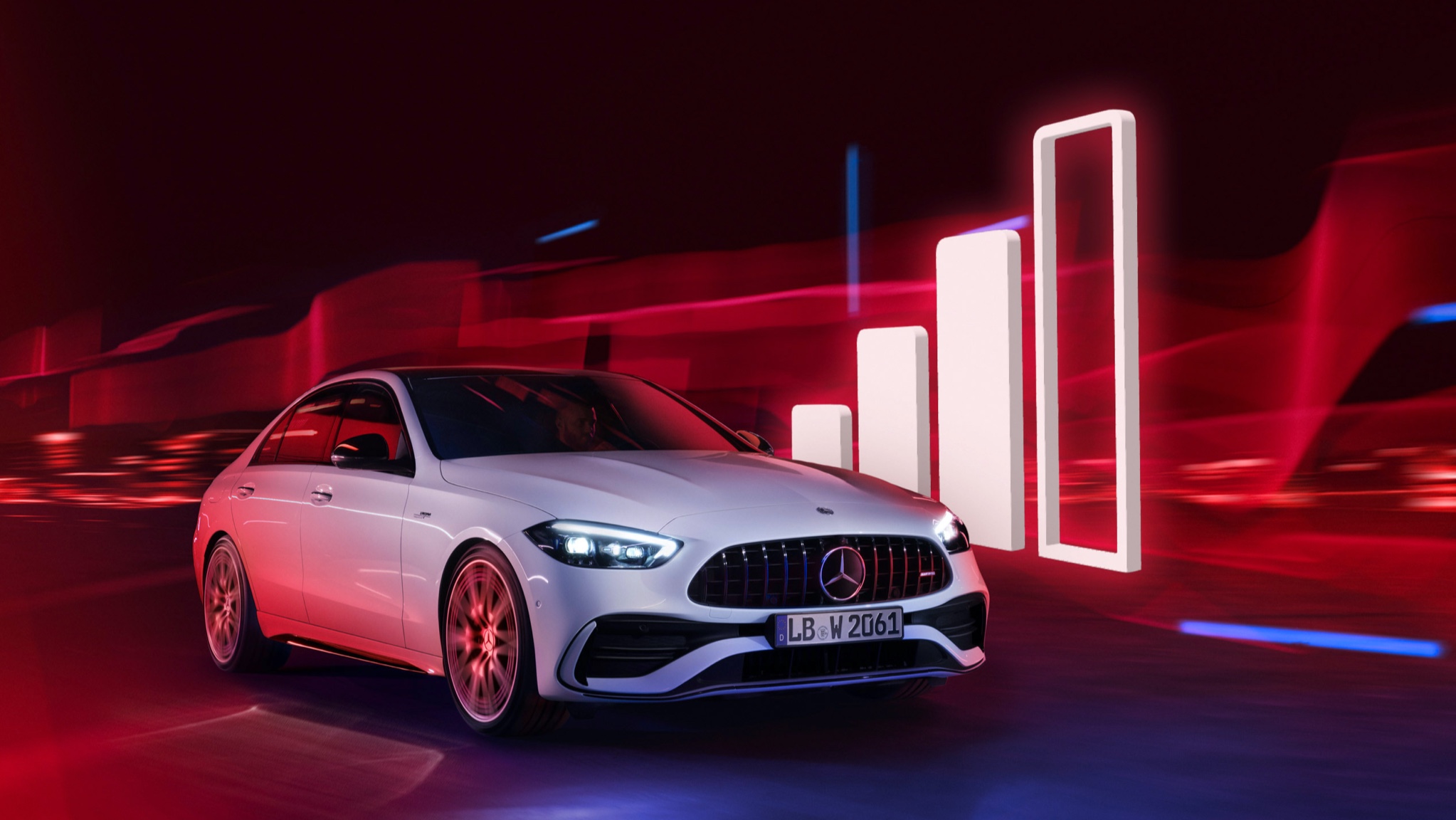 Komfortowy wolumen danych od dostawcy zewnętrznego | Rozrywka | Mercedes-Benz Mercedes-Benz przejeżdża obok wizualizacji symbolu zasięgu.