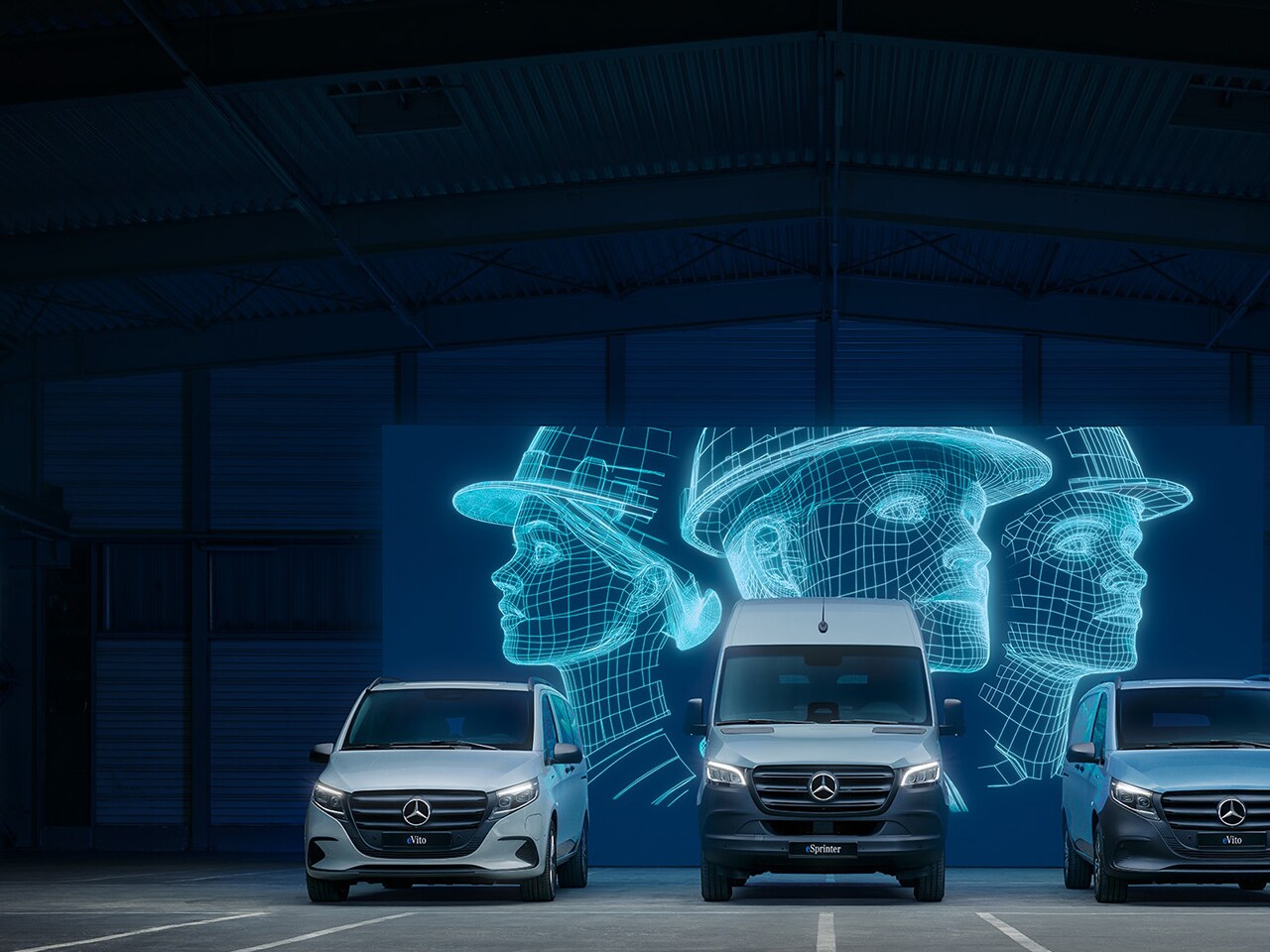 Elektryczne samochody dostawcze Mercedes-Benz w nowoczesnym otoczeniu magazynowym.