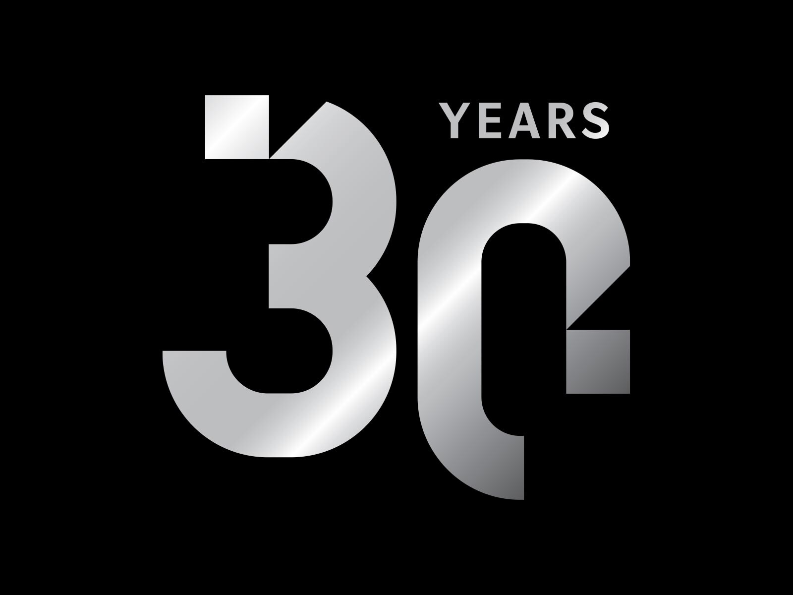 Szary napis „30 years” czarnym tle.