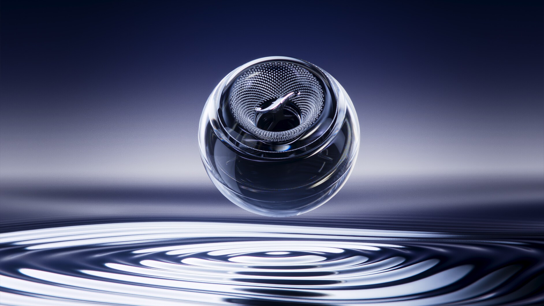 Głośnik unosi się nad powierzchnią wody, a pod nim tworzą się delikatne fale.